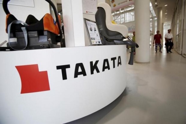 A logo of Takata Corp is seen with its display at a showroom for vehicles in Tokyo