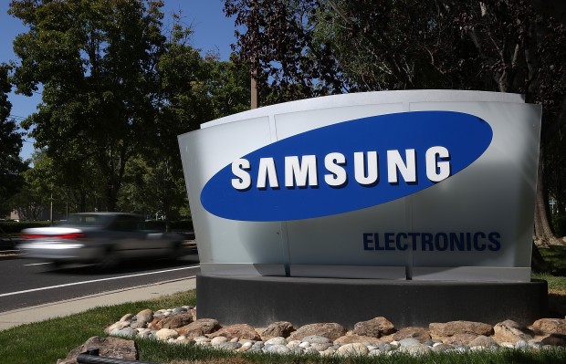 SAN JOSE, CA - JULY 30: A sign is posted in front of a Samsung Electronics office on July 30, 2012 in San Jose, California. The trial in the Apple Inc. and Samsung Electronics Co. patent battle begins today at a San Jose federal courthouse to determine if Samsung illegally copied technolgy used in Apple's popular iPhone and iPads. Apple is seeking $2.5 billion in damages. (Photo by Justin Sullivan/Getty Images)