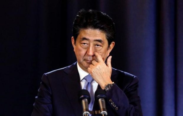 Japanese Prime Minister Shinzo Abe gestures during a press conference in Buenos Aires, Argentina, November 21, 2016. REUTERS/Agustin Marcarian