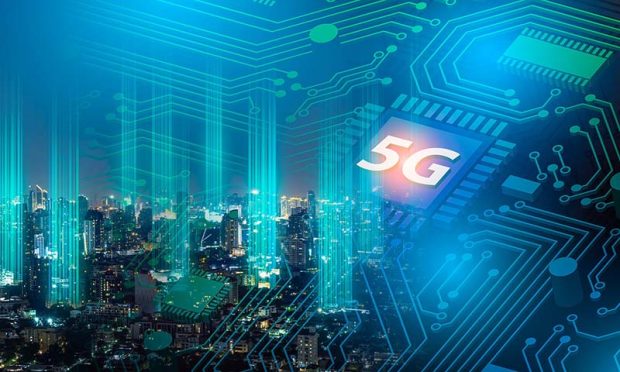 5G network digital hologram and internet of things on city background.Double exposure city of cpu 5g.5G network wireless systems,IoT(Internet of Things),communication network concept.