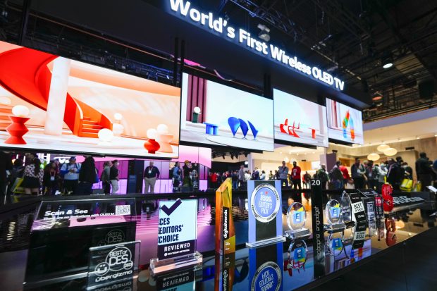 Multiple awards are shown in front of the 97 LG SIGNATURE OLED M, the worlds first consumer TV with Zero Connect technology, at the LG Electronics booth during CES 2023, Friday, Jan. 6, 2023, in Las Vegas.(Jack Dempsey/AP Images for LG)