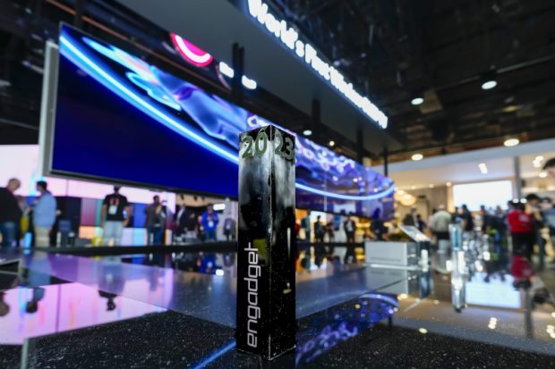 The 2023 Engadget Best Home Theater award is shown in front of the 97 LG SIGNATURE OLED M, the worlds first consumer TV with Zero Connect technology, at the LG Electronics booth during CES 2023, Friday, Jan. 6, 2023, in Las Vegas. (Jack Dempsey/AP Images for LG)