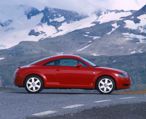 The first-generation Audi TT Coupé (photographed in the mountains).
