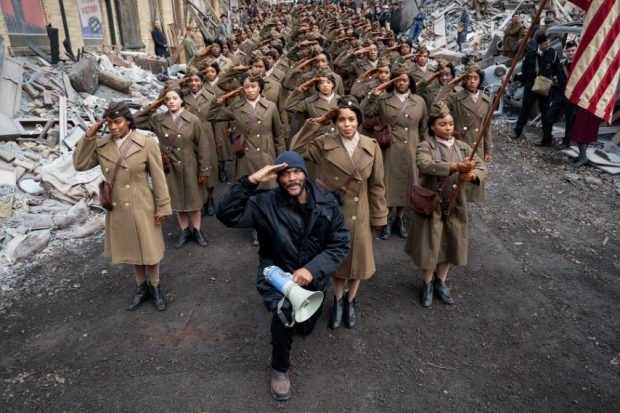 Six Triple Eight. Writer/Director/Producer Tyler Perry, Kerry Washington and the cast of Six Triple Eight. Cr. Laura Radford / Perry Well Films 2 / Courtesy of Netflix