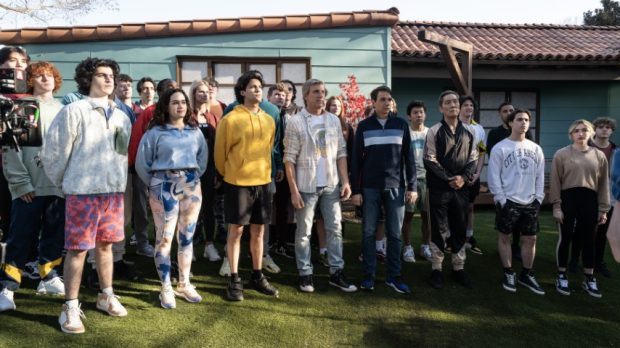 Cobra Kai. (L to R) Griffin Santopietro as Anthony LaRusso, Mary Mouser as Samantha LaRusso, Xolo Maridueña as Miguel Diaz, William Zabka as Johnny Lawrence, Ralph Macchio as Daniel LaRusso, Nathaniel Oh as Nate, Yuji Okumoto as Chozen Toguchi, Tanner Buchanan as Robby Keene, Peyton List as Tory Nichols in Cobra Kai. Cr. Curtis Bonds Baker/Netflix © 2024